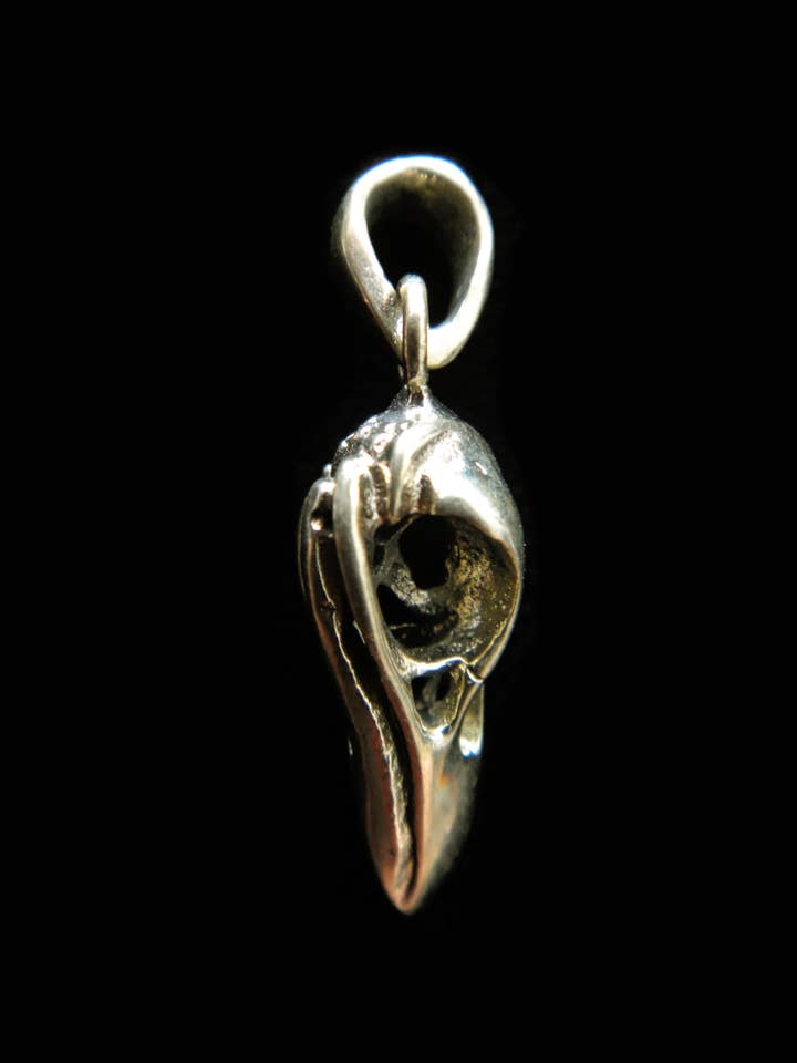 Raven Skull Pendant- Gold Toned for wholesale by Tika