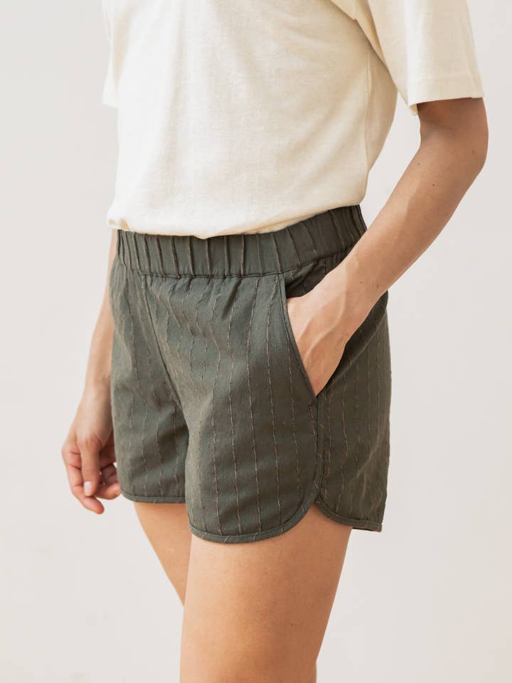 Luca Track Short / Linen Olive Stripe for wholesale by Bridge & Burn