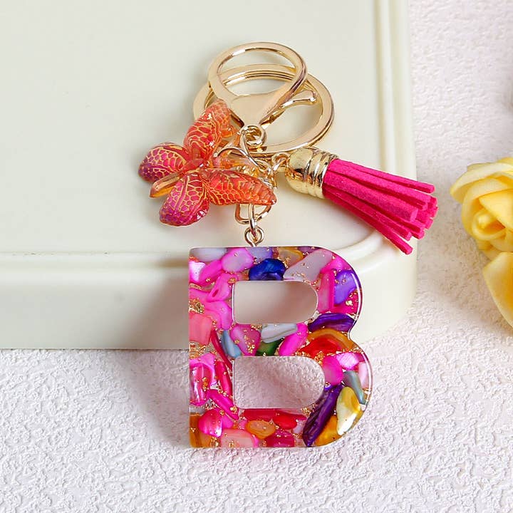 MKS America - Wholesale Keychain - Women's - Glitter Butterfly 26 English Letter Tassel Resin Keychain1