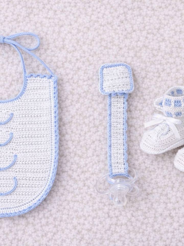The Little Beau Blue Booties, Bib, and Pacifier Clip Set for wholesale by Expectations