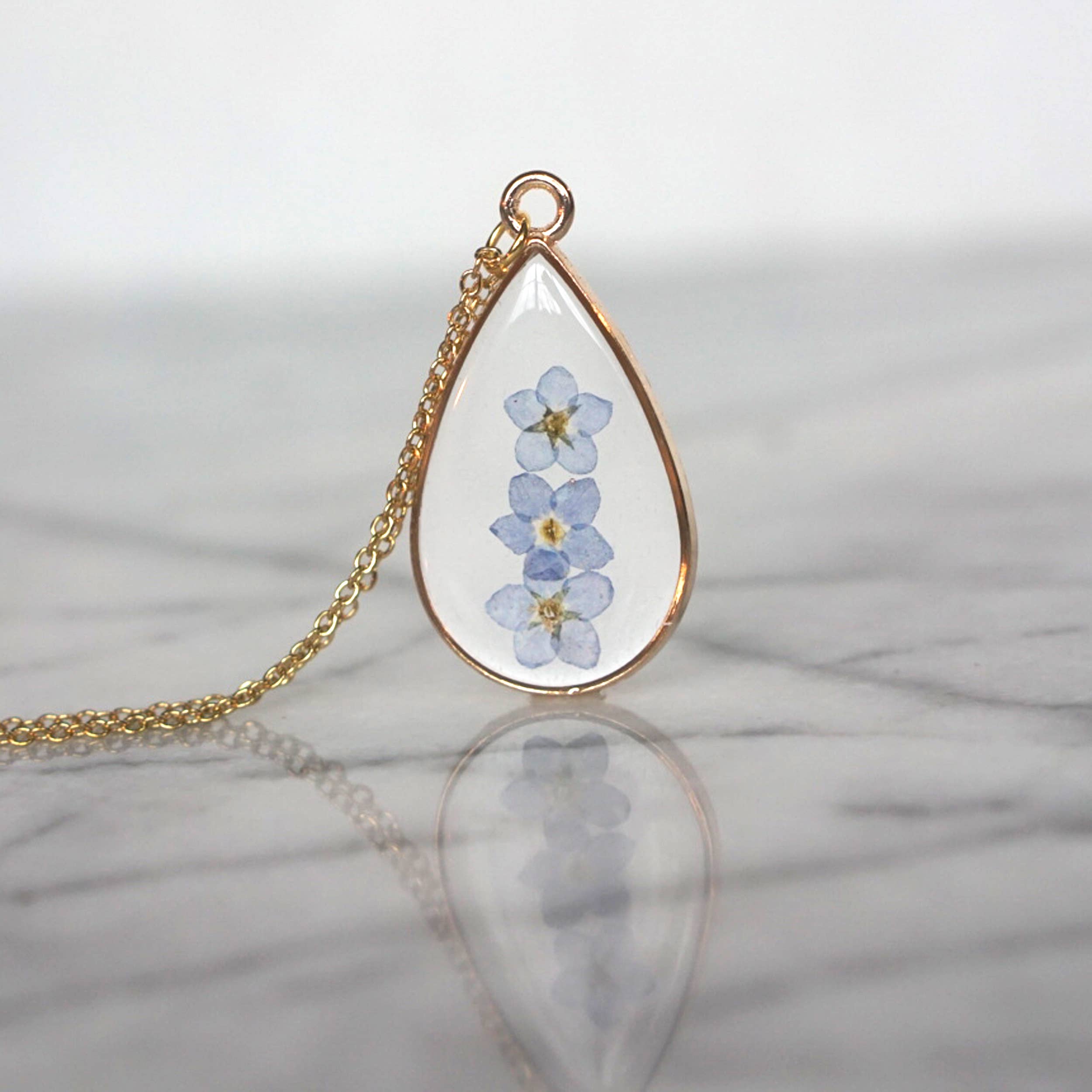 The Pretty Pickle - Wholesale Pendant/Charm Necklace - Forget Me Not Flower Necklace- Gold Plated2