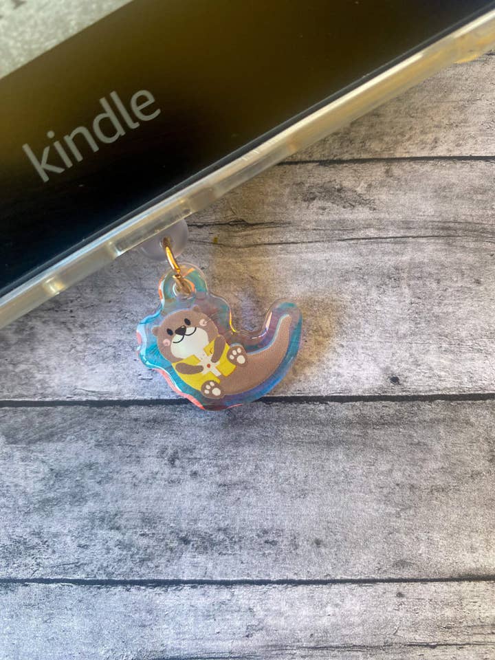 Otter Postal Service Crescent City Holographic Charm for wholesale by The Bookish Teacup Co.