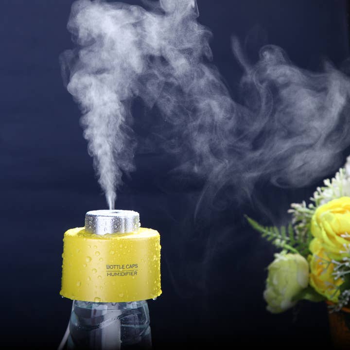 HUMIDIFICATEUR POUR BOUTEILLE JAUNE pour la vente par Digital Cameras S.L.