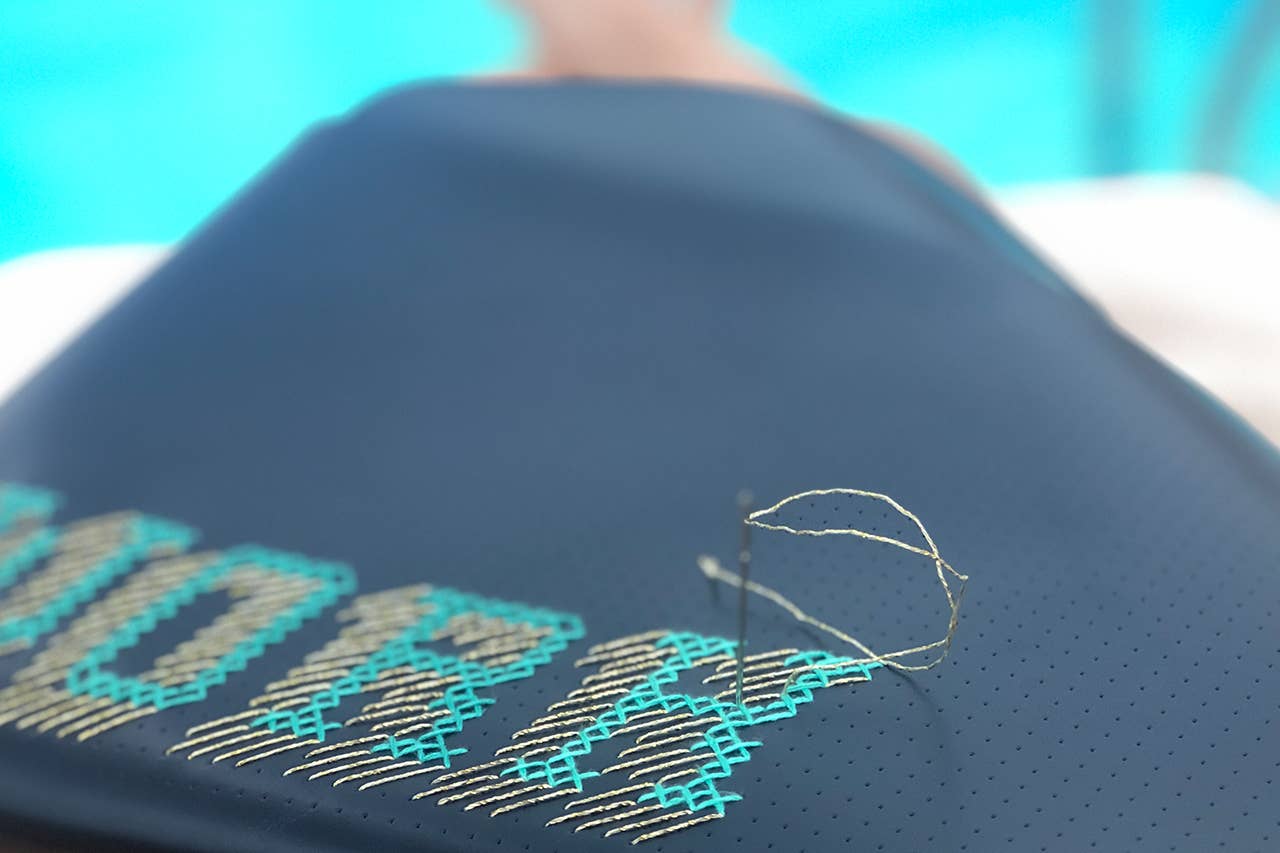 Chasing Threads - Wholesale DIY Craft Kit - DIY Cross Stitch Laptop Sleeve Kit - Navy with teal thread6