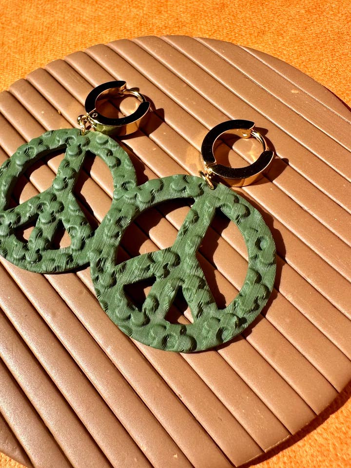 Peace Huggie hoops for wholesale by She makes clay