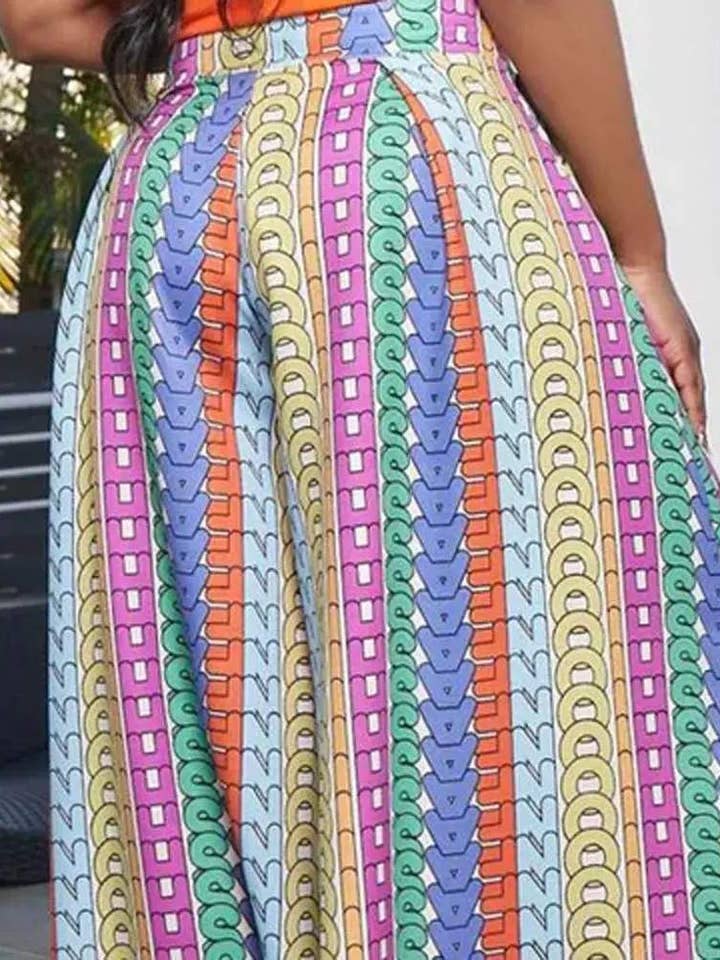 MULTICOLORE pantaloni larghi con dettaglio plissettato stampa lettere allover in vendita all'ingrosso su Faire