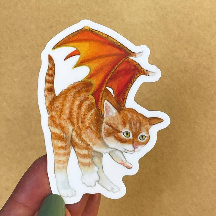 Dragon Kitten Orange Wings Vinyl STICKER for wholesale by Amy Rose Moore Illustration