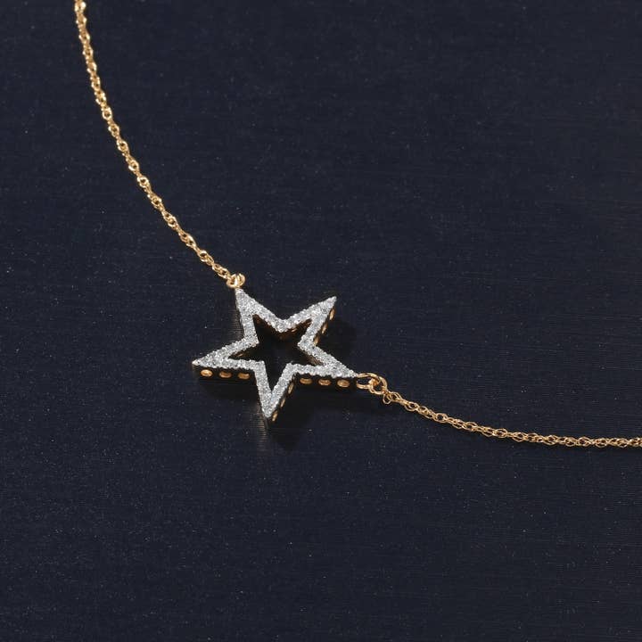 1/8ct TDW Diamond Star Pendant Necklace in 10K Gold for wholesale by De Couer New York