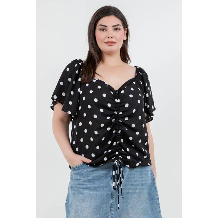 PLUS SIZE POLKA DOT PRT WOVEN SHORT SLEEVE RUCHED TOP for wholesale by The Curve LA