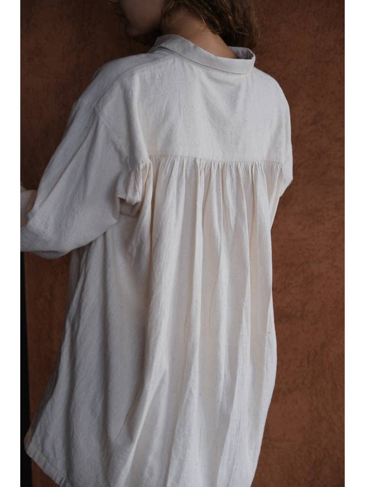 The White Artist Smock for wholesale on Faire
