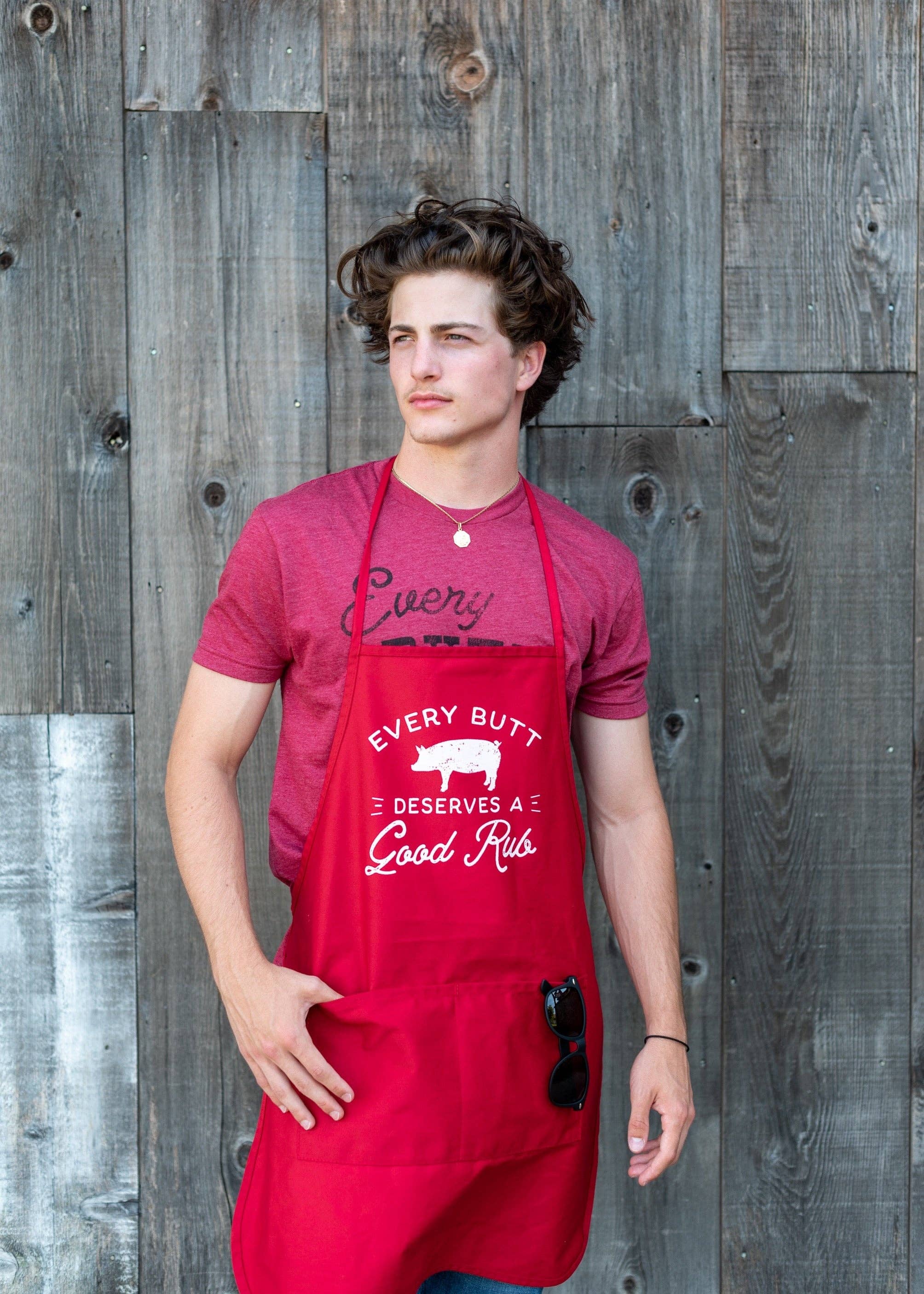 Red Every Butt Deserves a Good Rub Apron for wholesale on Faire1