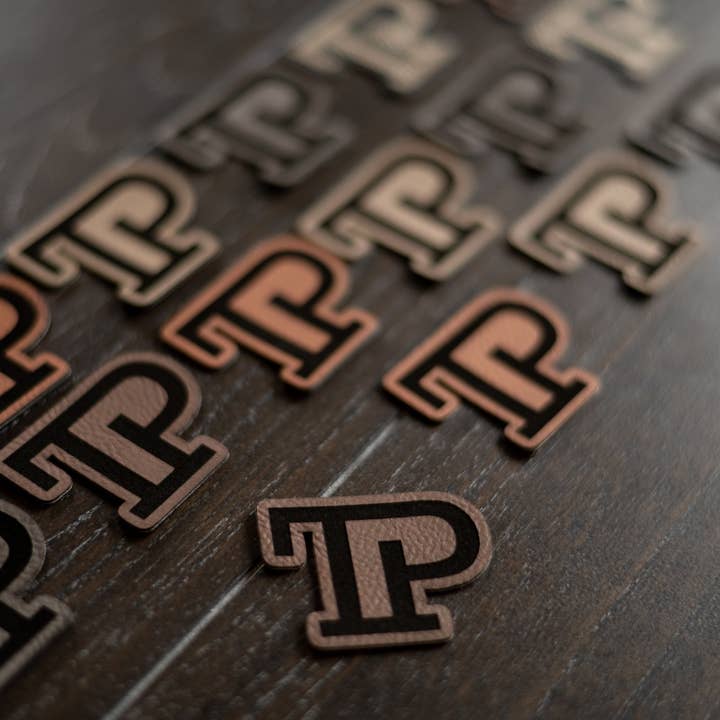 Laser Engraved Leatherette Patches Heat Activated Adhesive for wholesale by Twisted Pines Design Co.