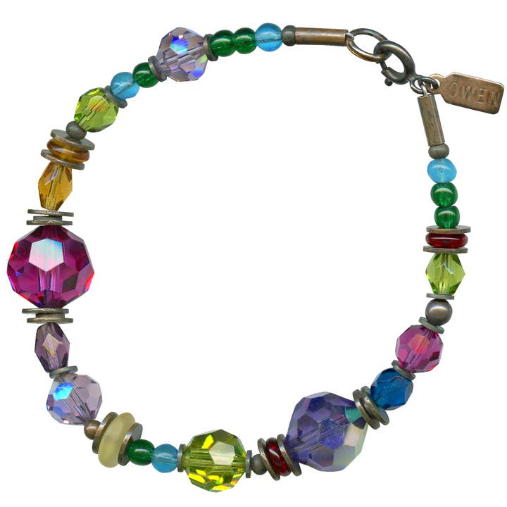 BRACELET À COMMENTAIRES PERSAN (BRONZE) - FUCHSIA, SAPHIR, TOPAZE pour la vente par Owen Glass Collection