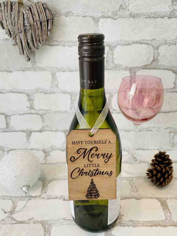 Etiqueta de botella y decoración: «Ten una feliz Navidad» para venta al por mayor de The Funky Deer