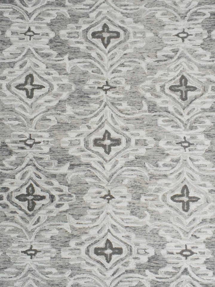 Handmade Ivory and Gray Tufted Rug for wholesale by The Rug Decor, Inc.