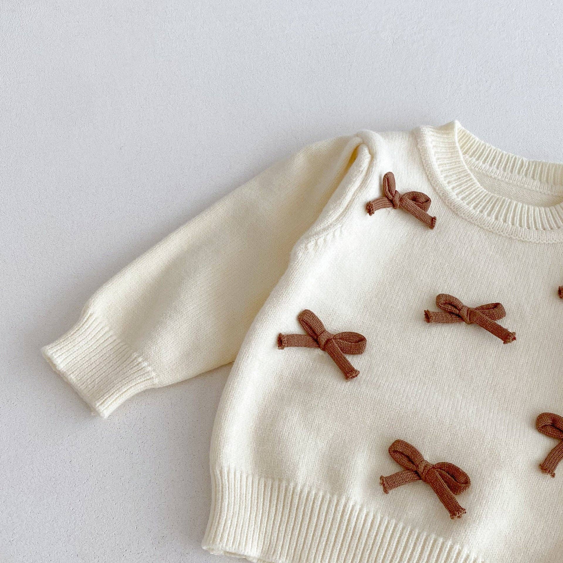 café léger Ensemble 3 pièces : Pull d'automne-hiver pour filles avec nœud, pantalon évasé et sac à main en vente sur Faire2