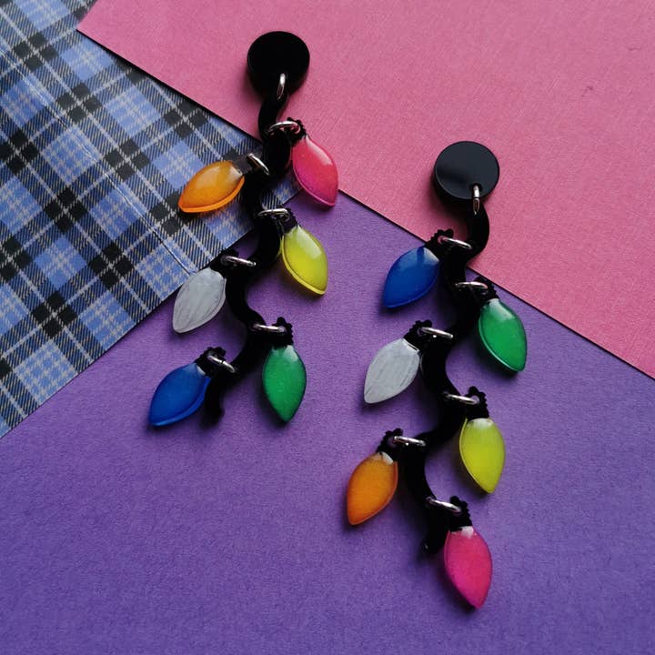 Glow in the dark fairy light earrings for wholesale by STOP. Jewellery