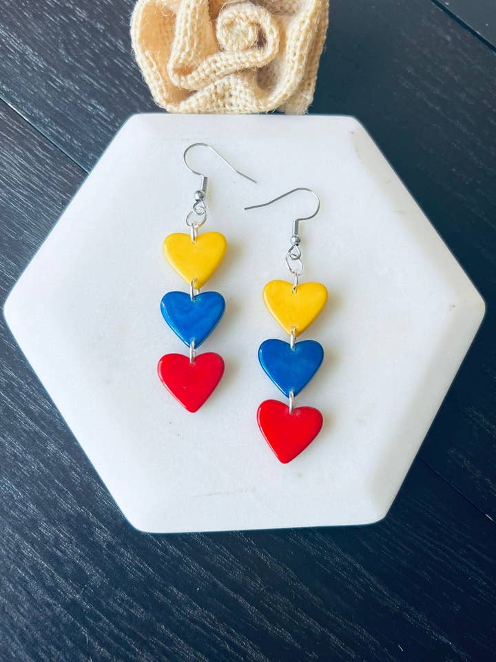 Colombia flag earrings Yellow blue and red hearts statement earrings Tagua jewelry gifts Ecuador fashion Venezuela flag pride Hypoallergenic for wholesale by Galapagos Tagua