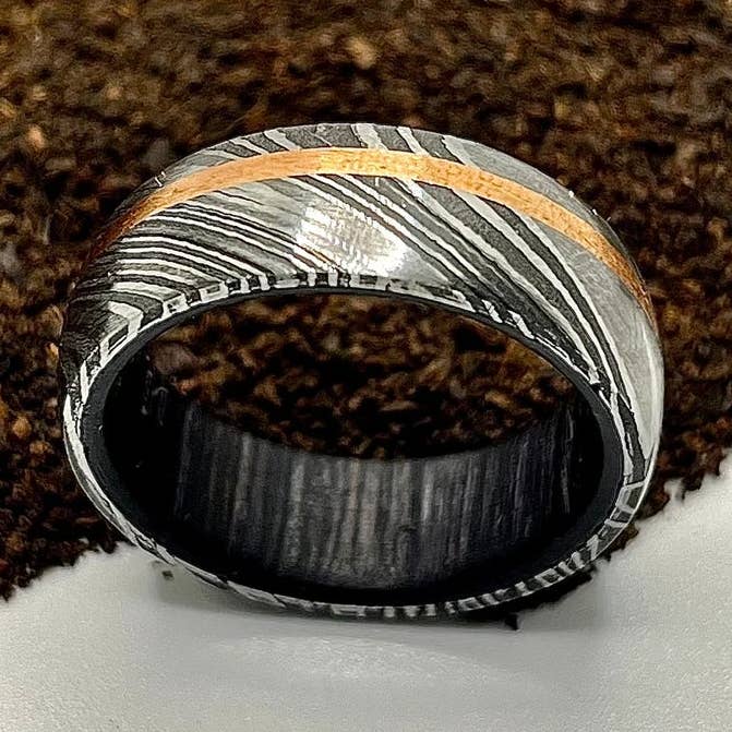 Handmade Black Damascus Steel Ring with Reddish Wood Sleeve | Unique & Durable for wholesale by RustyStudioUSA