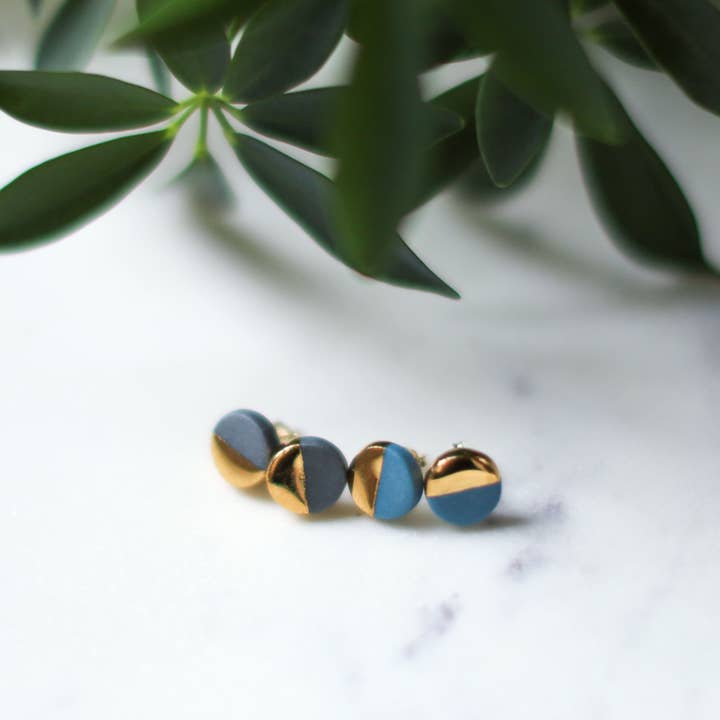 grey or teal round metallic studs for wholesale by Remnant Studios