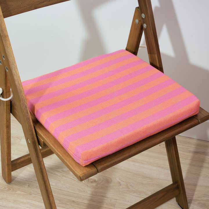 Maglia Raya pude til sæde, polstret, vandafvisende, fuchsia og orange 40x40x5 cm for engroshandel hos SG HOGAR