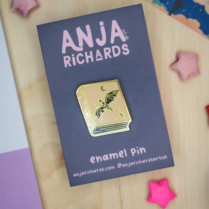 Feather Book Enamel Pin for wholesale by Anja Richards Art