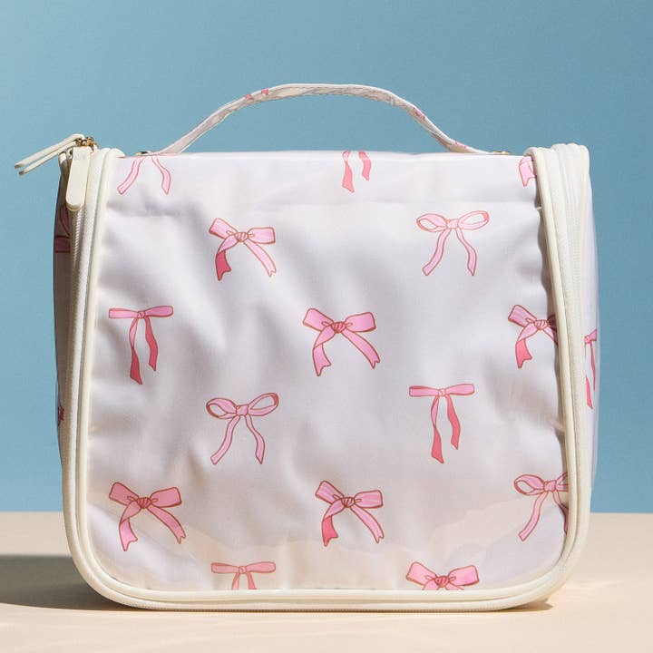Pink Bow Print Hanging Toiletry Bag – Travel Makeup Organizer with Handle for wholesale by Lilla Haven
