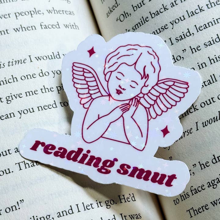 Cosmic Paper Studio – Großhandel Aufkleber – Angelaufkleber „Reading Smut Cherub“0