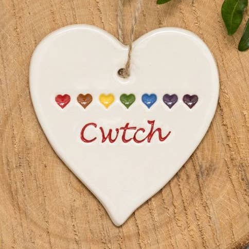 Welsh - Cwtch with rainbow hearts - Handmade ceramic heart for wholesale by Broadlands Pottery
