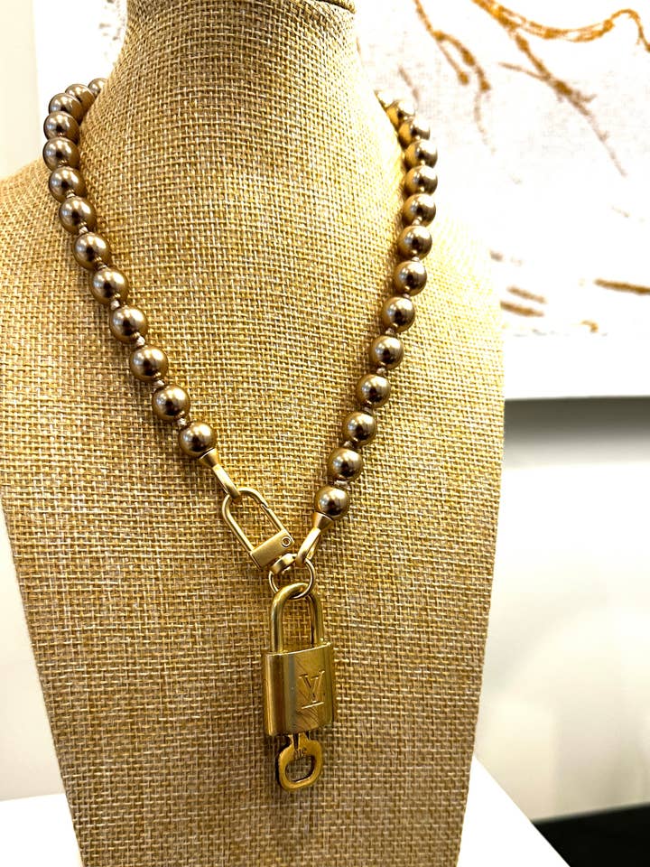 Authentic Vintage Vuitton Lock w/key on Bronze Beads for wholesale by The French Pearl