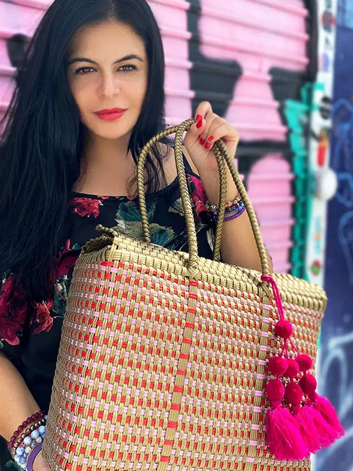 Gold and Pink Handwoven recycled plastic beach Bags for wholesale by The Faria