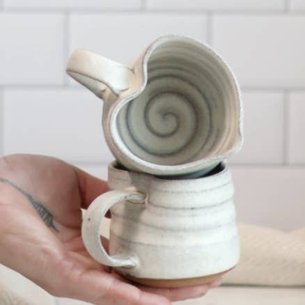 Handmade Heart-Shaped Tea & Espresso Mug Cream for wholesale by Gravesco Pottery