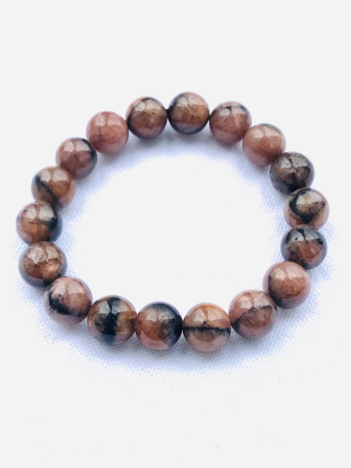 Chiastoliet ronde kralenarmbanden van 10 mm voor wholesale door Crystal Universe