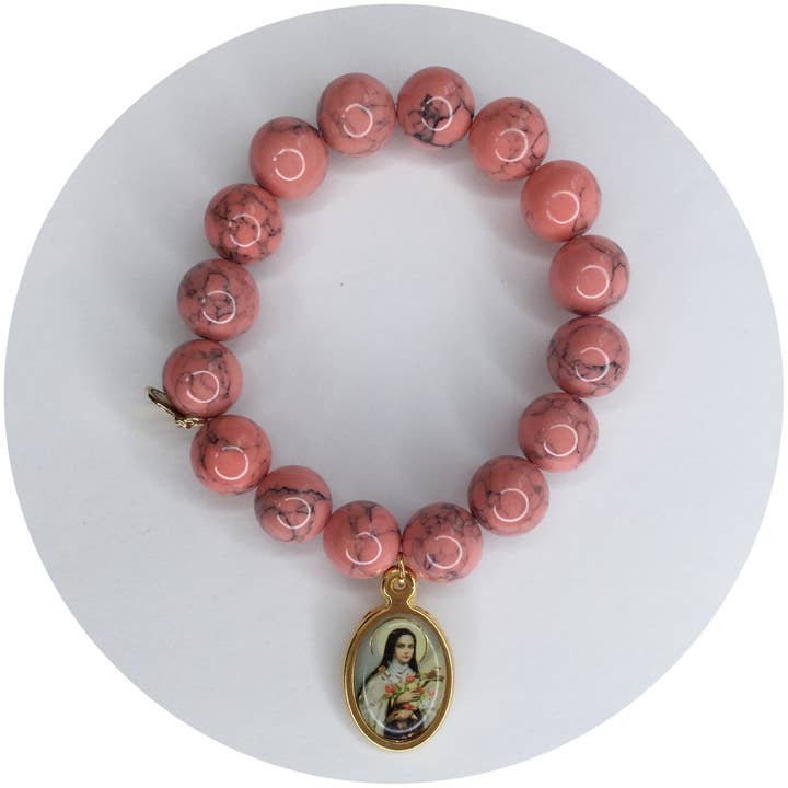 Coral Pink Howlite with St. Teresa Pendant for wholesale by Oriana Lamarca Designs