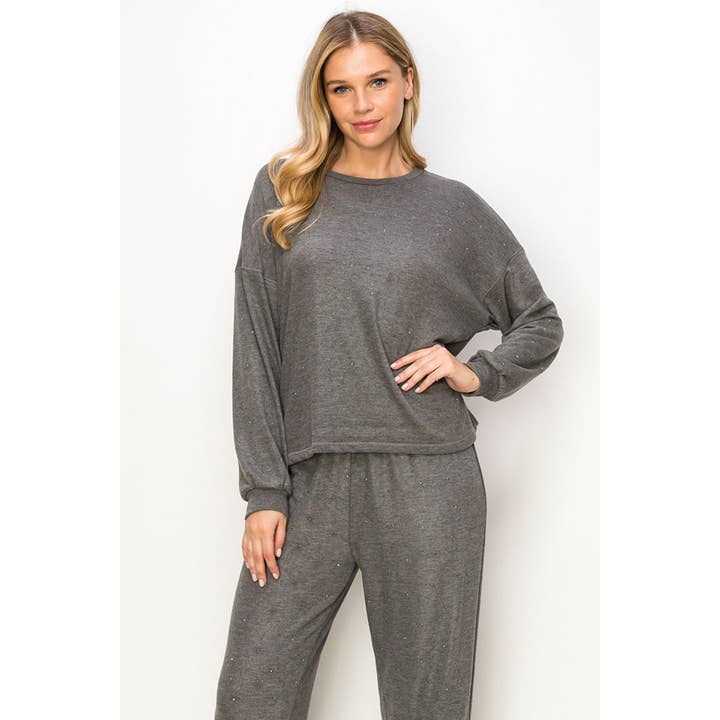 TOP IN MAGLIA HACCI A MANICHE LUNGHE CON STRASS per la vendita all'ingrosso da parte di VOCAL