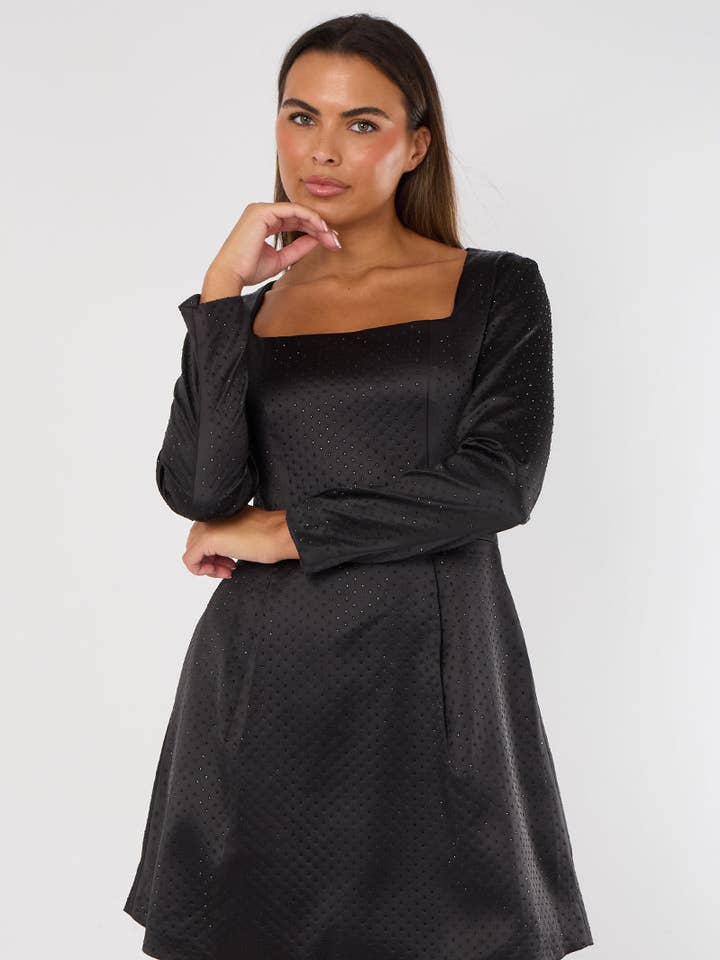 Langærmet sort paillet minikjole med lommer for engroshandel hos Elainah Fashion