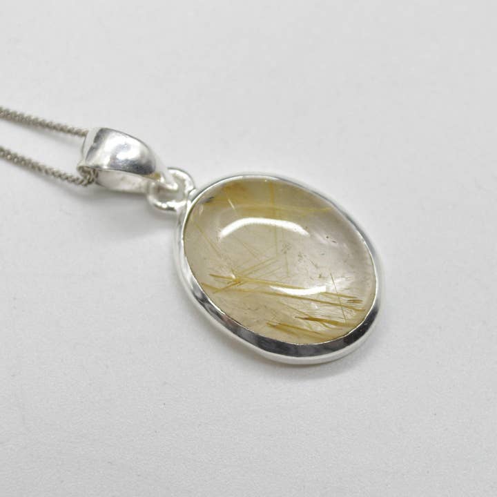 Golden Rutilated Quartz Oval Pendant in Sterling Silver for wholesale by Oriental Direct Craft Supplies