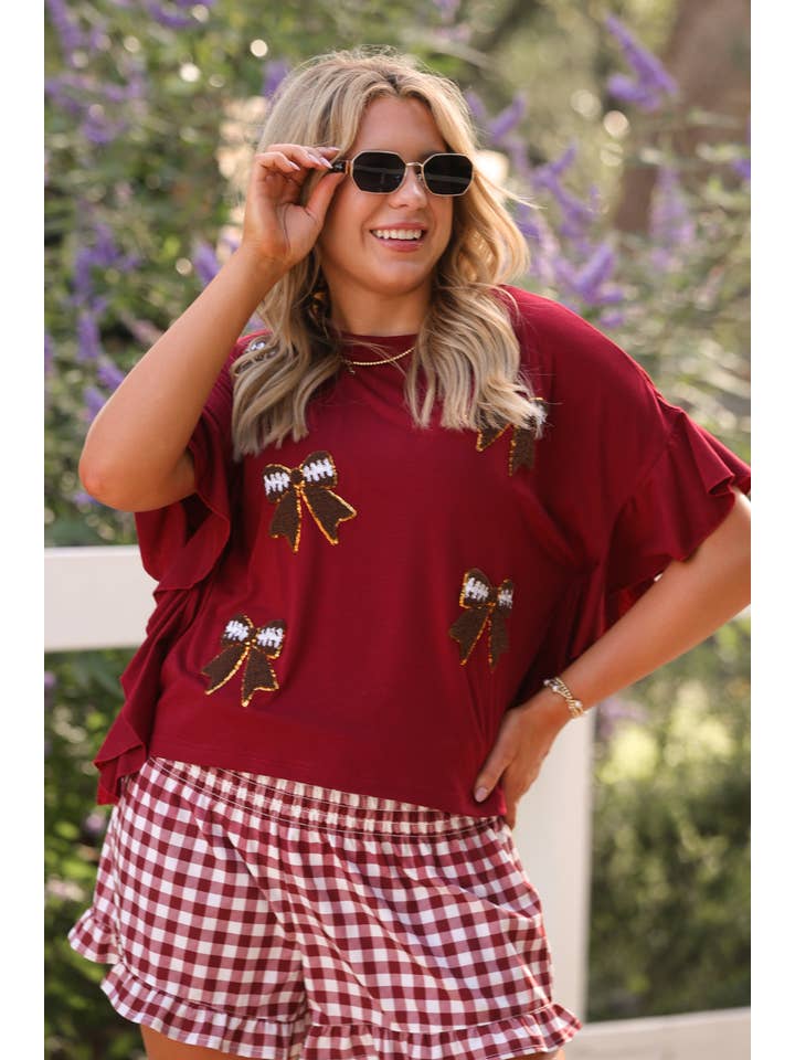 Sideline Sparkle Ruffle Top- Maroon for wholesale on Faire1
