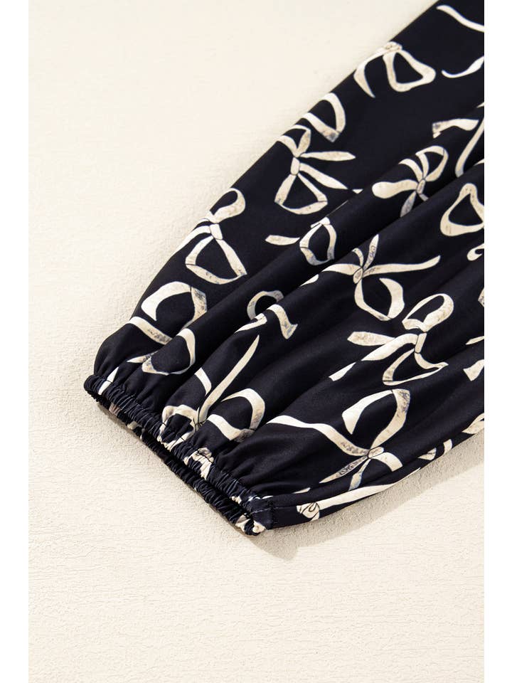 Nero Blusa a maniche lunghe con fiocco patchwork taglie forti in vendita all'ingrosso su Faire7