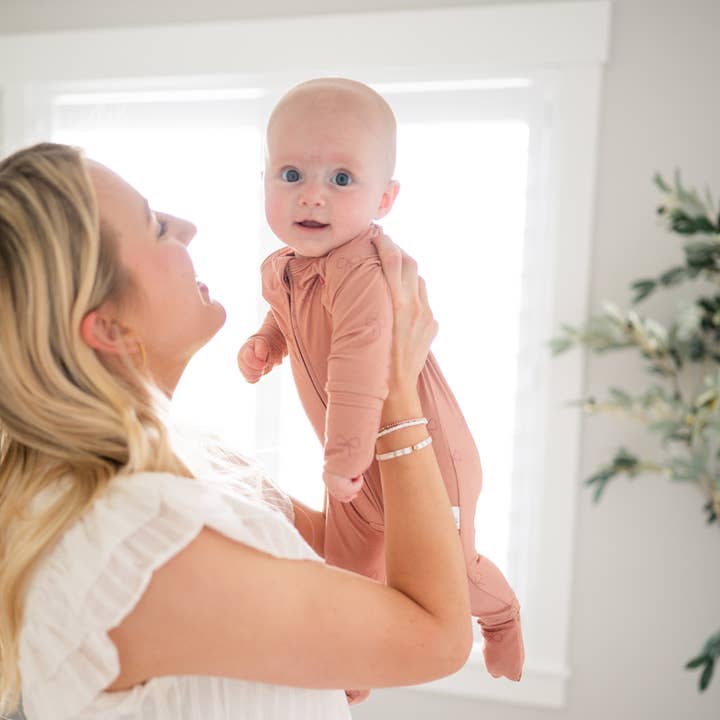 Bamboo 2-Way Convertible Zip Romper | Pink Bow (0-24m) for wholesale by bug + bean kids