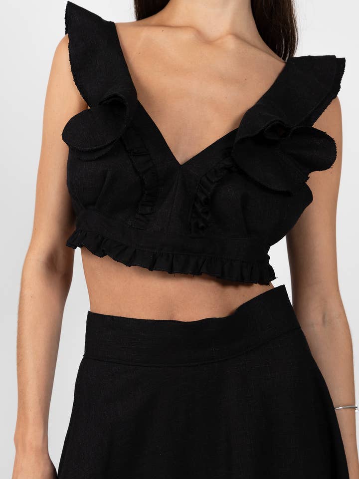 Top corto in lino con volant e fiocco sul retro in nero per la vendita all'ingrosso da parte di Gipcco Design
