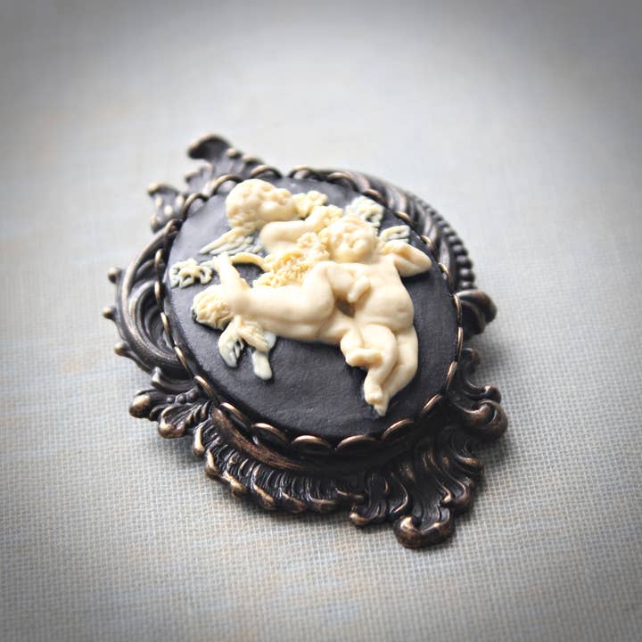 Circa 1890 - Wholesale Brooch - Large Art Nouveau Black & Ivory Cherub Cameo Brooch/Pendant