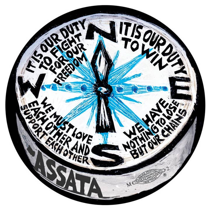 Ricardo Levins Morales Art Studio - Wholesale Lapel Pin/Button - Assata's Compass (Button)