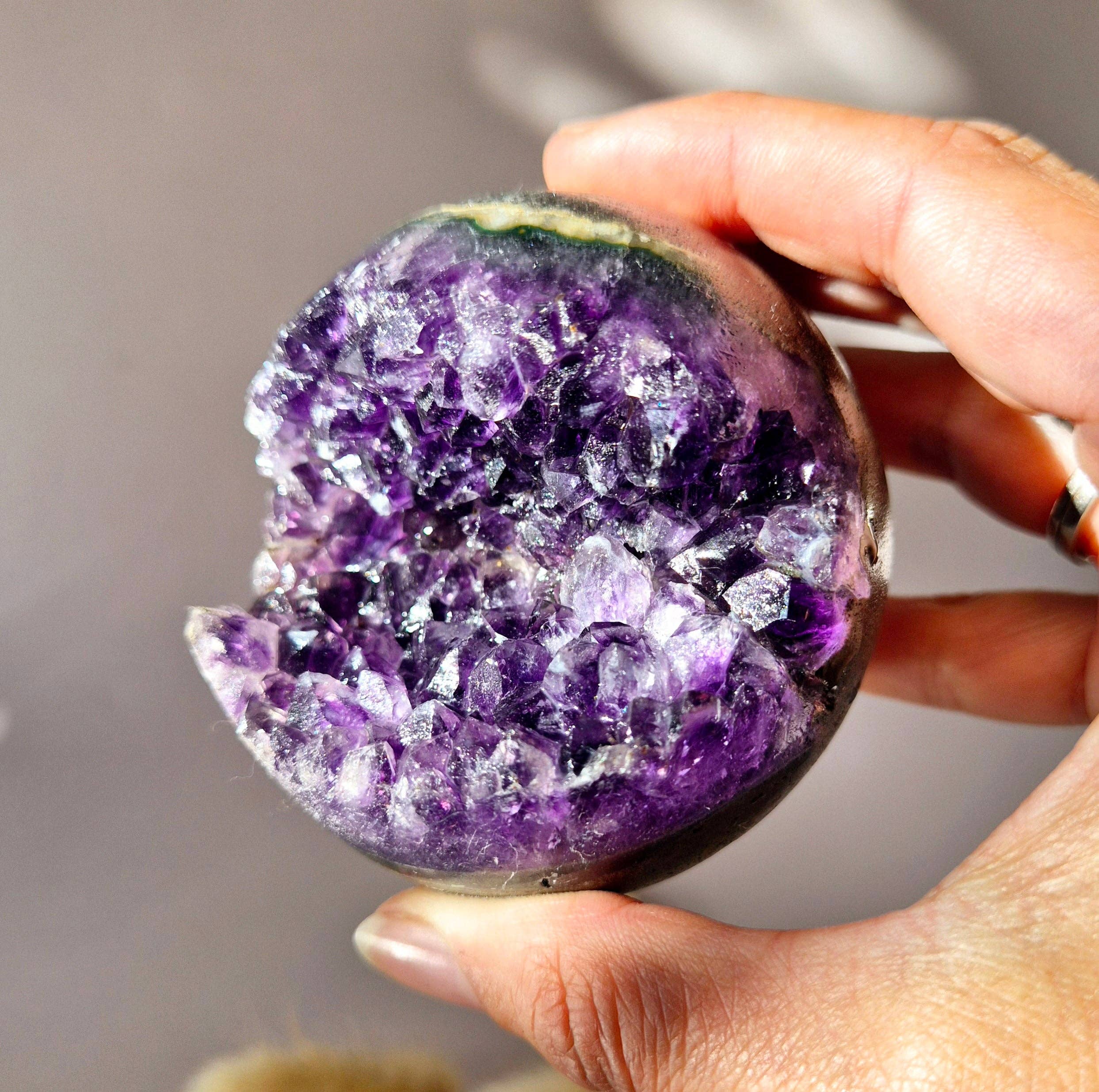 Moonlight Gemstones – wholesale Spiritual stone/crystal – High Quality Gemstone Amethyst Geode Sphere (60–70 mm)0