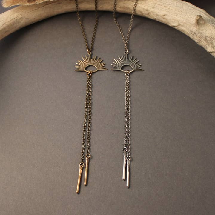 Sun bolo style necklace in silver or brass for wholesale by Crow Jane Jewelry