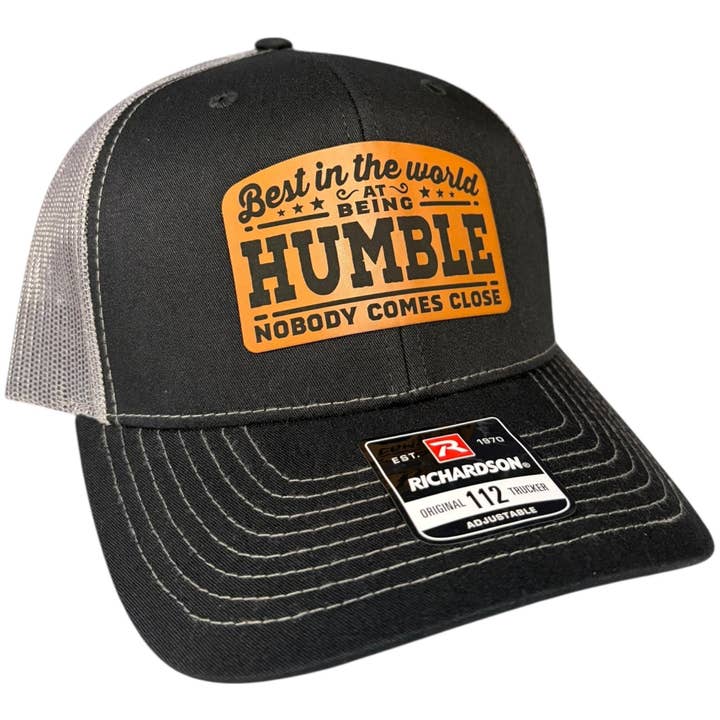 Best in the World at Being Humble Richardson 112 Trucker for wholesale by Brave Mind Hat Co