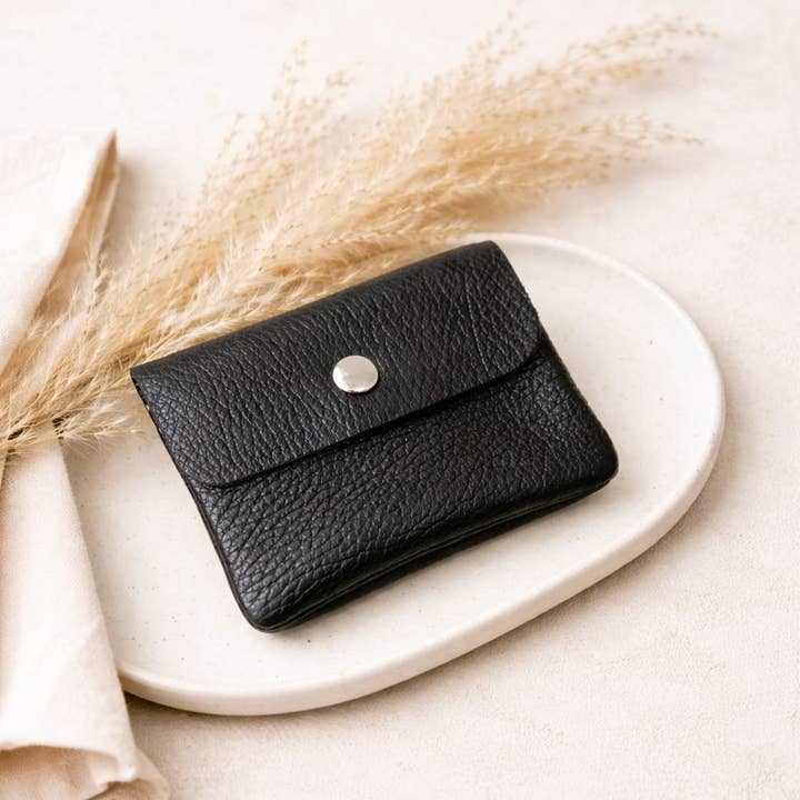 Petit portefeuille noir pour la vente par Ibiza Boutique