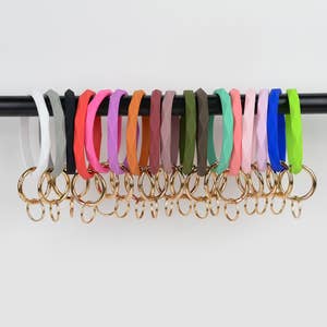 Purchase Wholesale keychain wristlet. Free Returns & Net 60 Terms on Faire