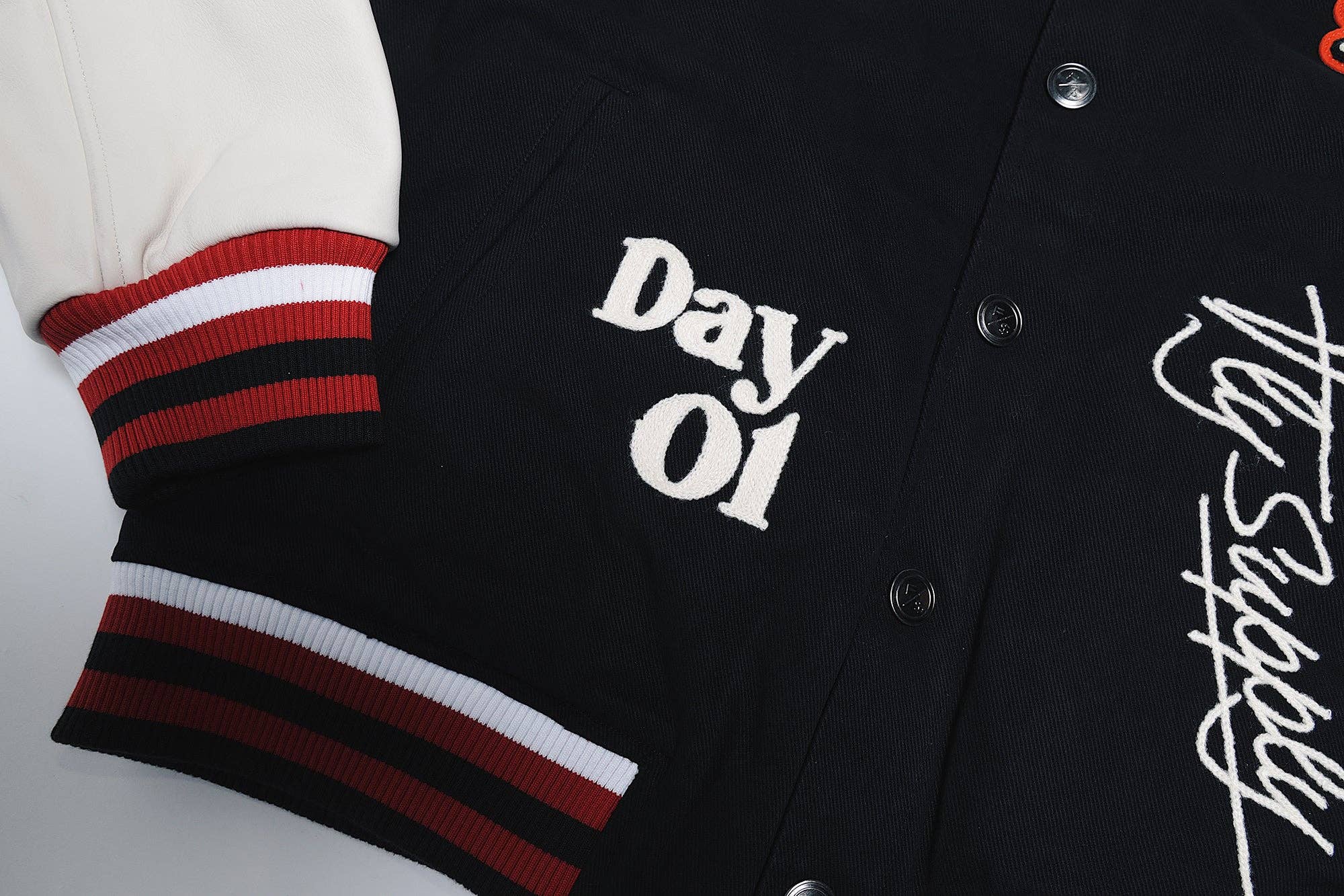 Denim Manifest Varsity Jacket (Black) for wholesale on Faire5