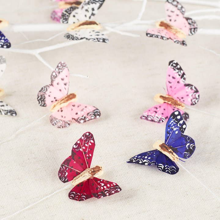 Factory Direct Craft - Venta al por mayor Flores artificiales - Mariposas de Plumas Artificiales Moteadas - Caja de 12
